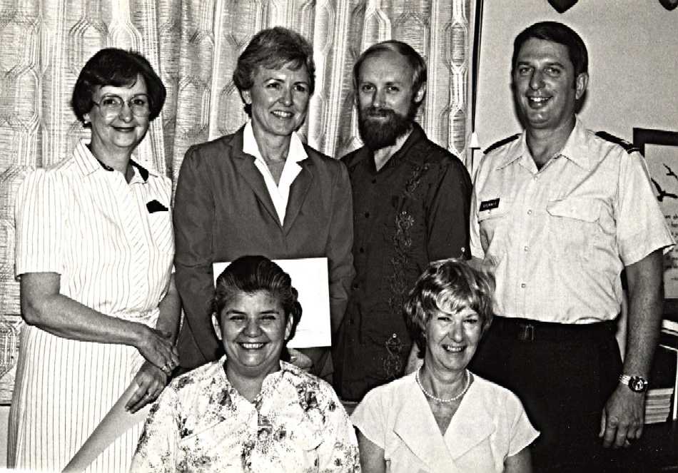 Top row from left: Betty Hansen, Pat Twist, Dr. A. David Mangelsdorff,  
COL David Brunner, commander; seated Refugia 